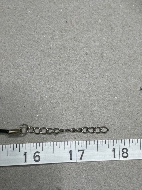 Black Tourmaline Pendant hanging from a 16″ Leather Cord with a 2′ extender
