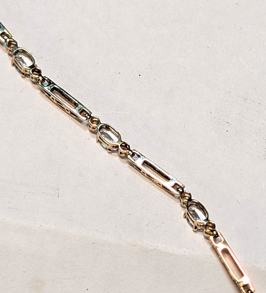 10K YELLOW GOLD AQUAMARINE TENNIS BRACELET 7 INCHES LONG & 3.20 GRAMS
