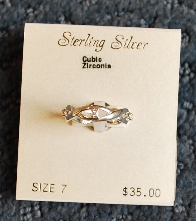 NWT – Sterling Silver Cubic Zirconia ring (size 7) weave design – MSRP $35