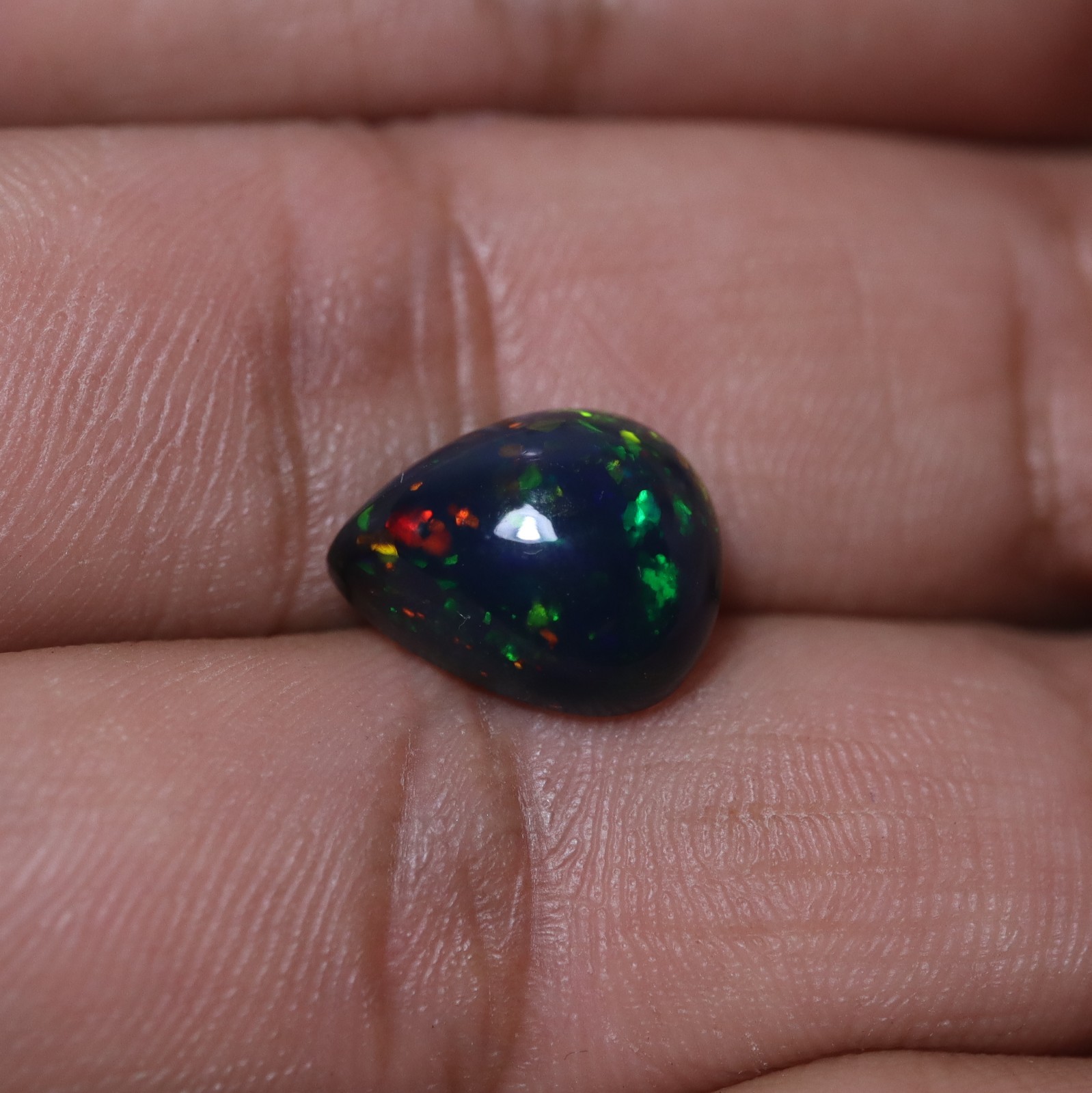 4.6Ct 13.2×10.6 MM Real AAA Multi Fire Smoked Black Ethiopian Opal Pear Cabochon