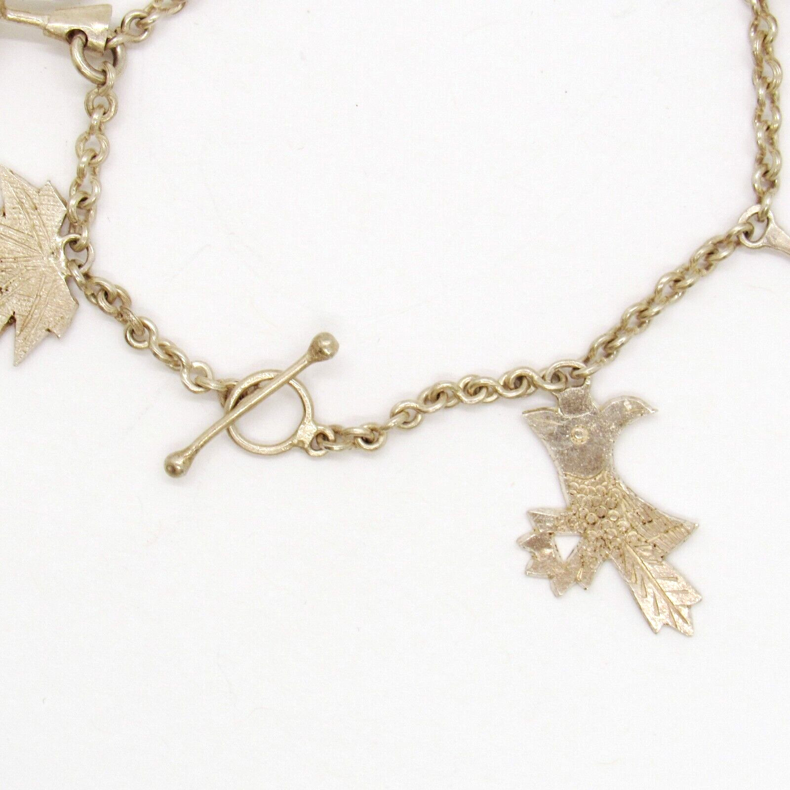 VINTAGE HANDMADE SILVER TIRBAL ORIENTAL SOUTHEAST ASIA CHARM ESTATE BRACELET