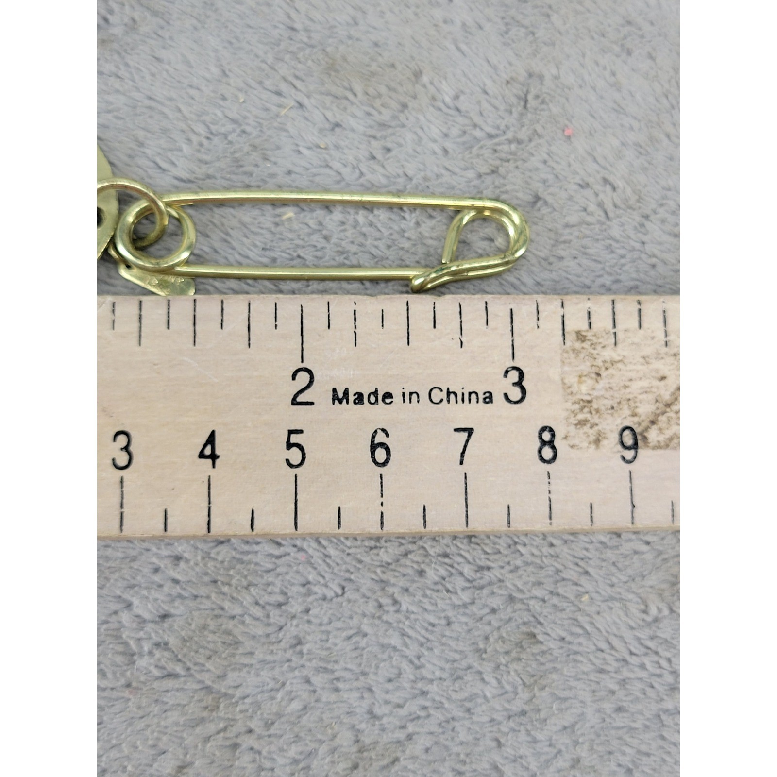 Vintage 1993 DKNY Gold Tone Safety Pin Brooch Round Logo Charm Pendant 3″