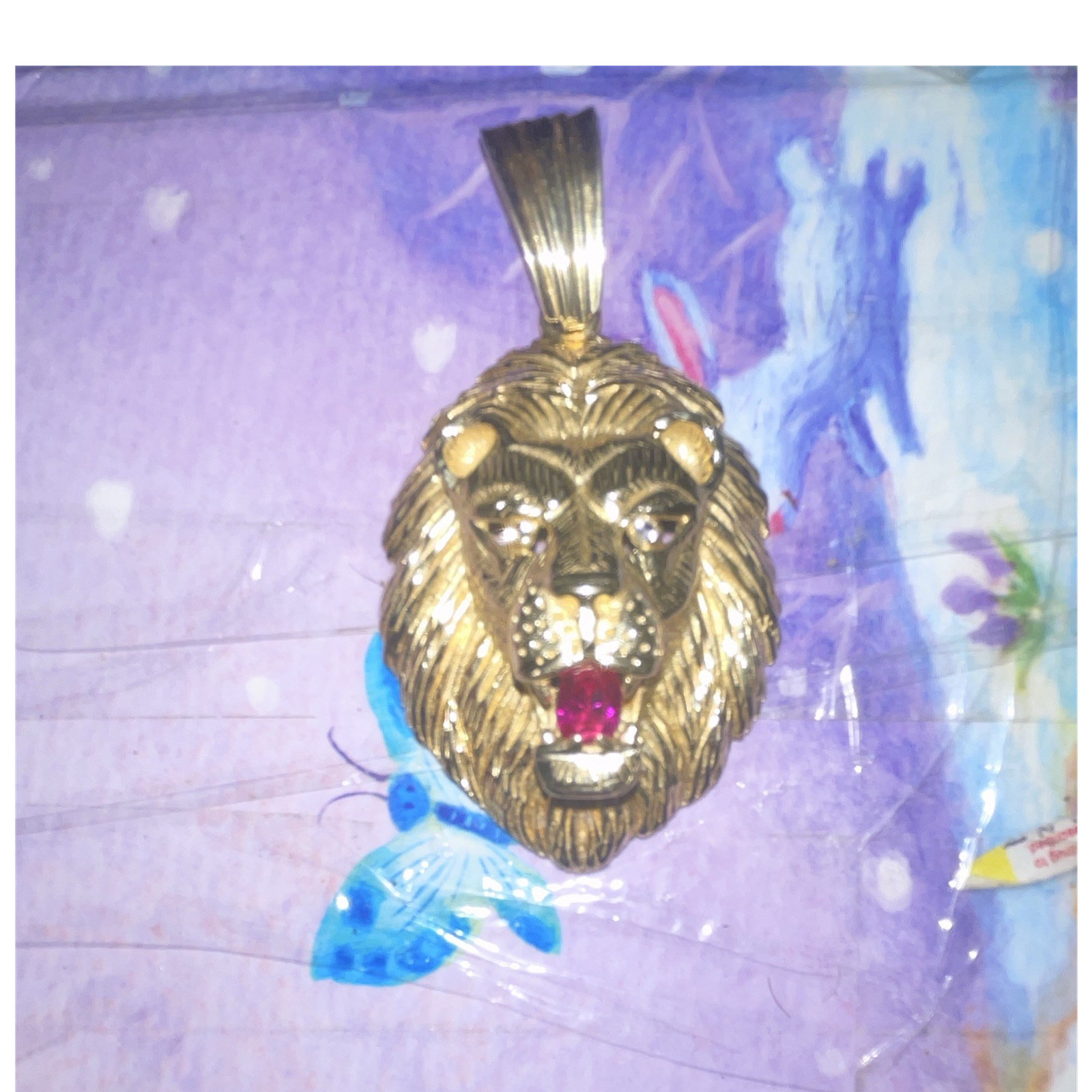 Men’s Gold Pendant 14k yellow gold approx 30g with diamond eyes and ruby mouth.