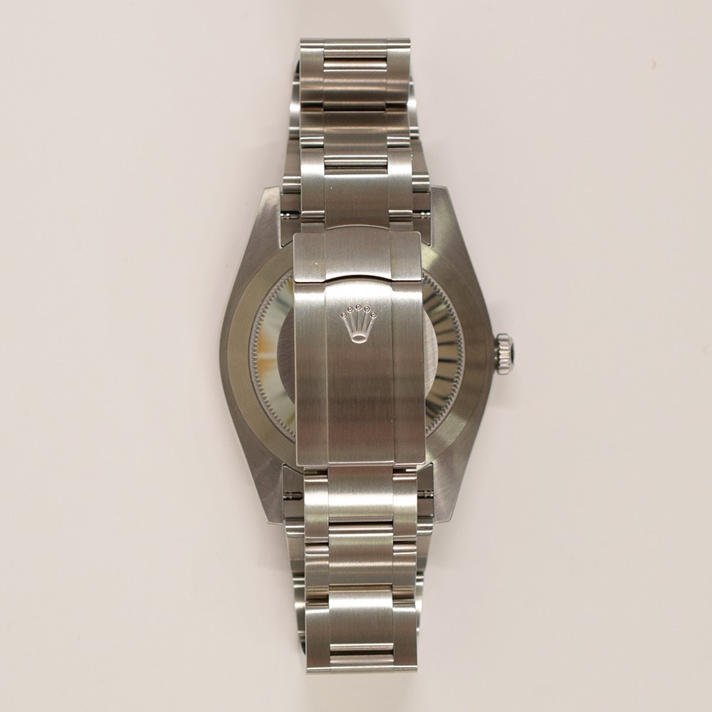 Rolex Oyster Perpetual 41 124300 Celebration Dial Steel Box & Papers Mint