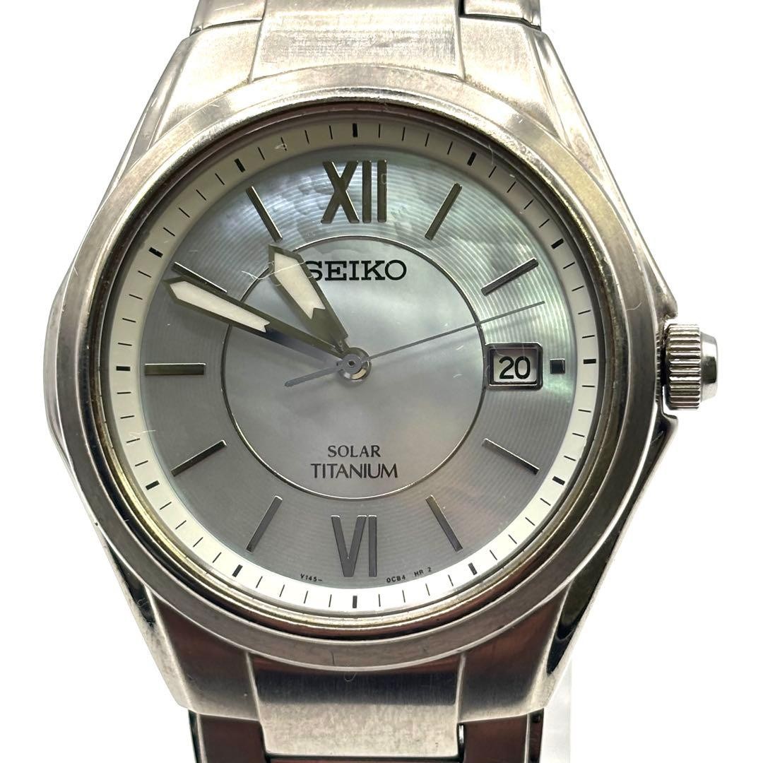 Working ,SEIKO solar-powered titanium watch with mother-of-pearl dial,From Japan