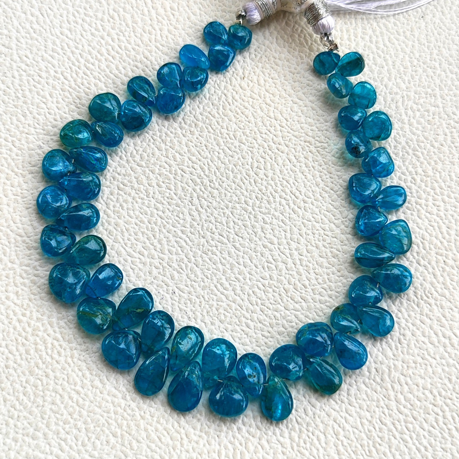 Madagascar Neon Blue Apatite Smooth Pear Shape Beads 6×4 to 8x6mm 7.5″ Strand