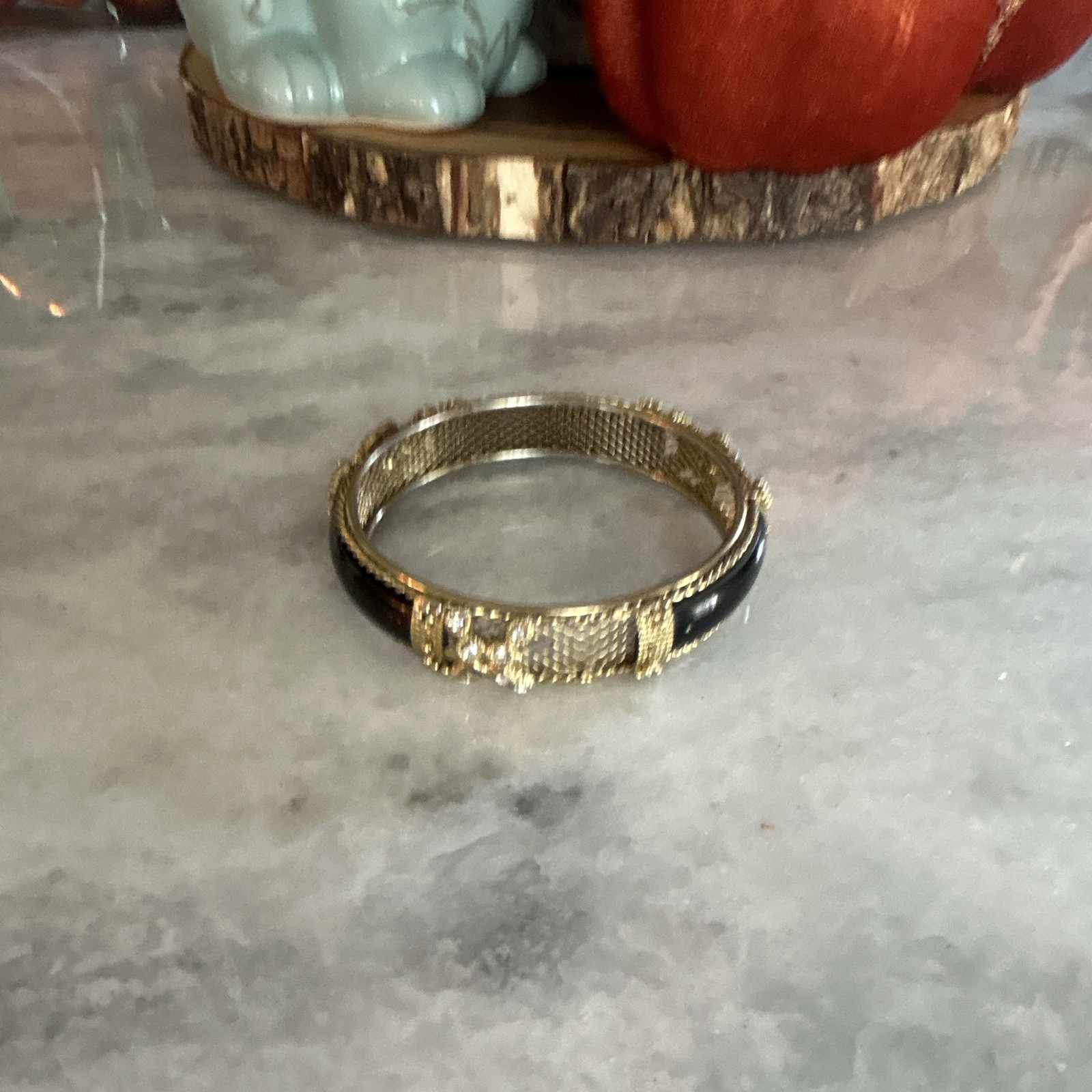Gold Tone Black Hinged Bangle Bracelet with Clear Crystal Rhinestone Floral