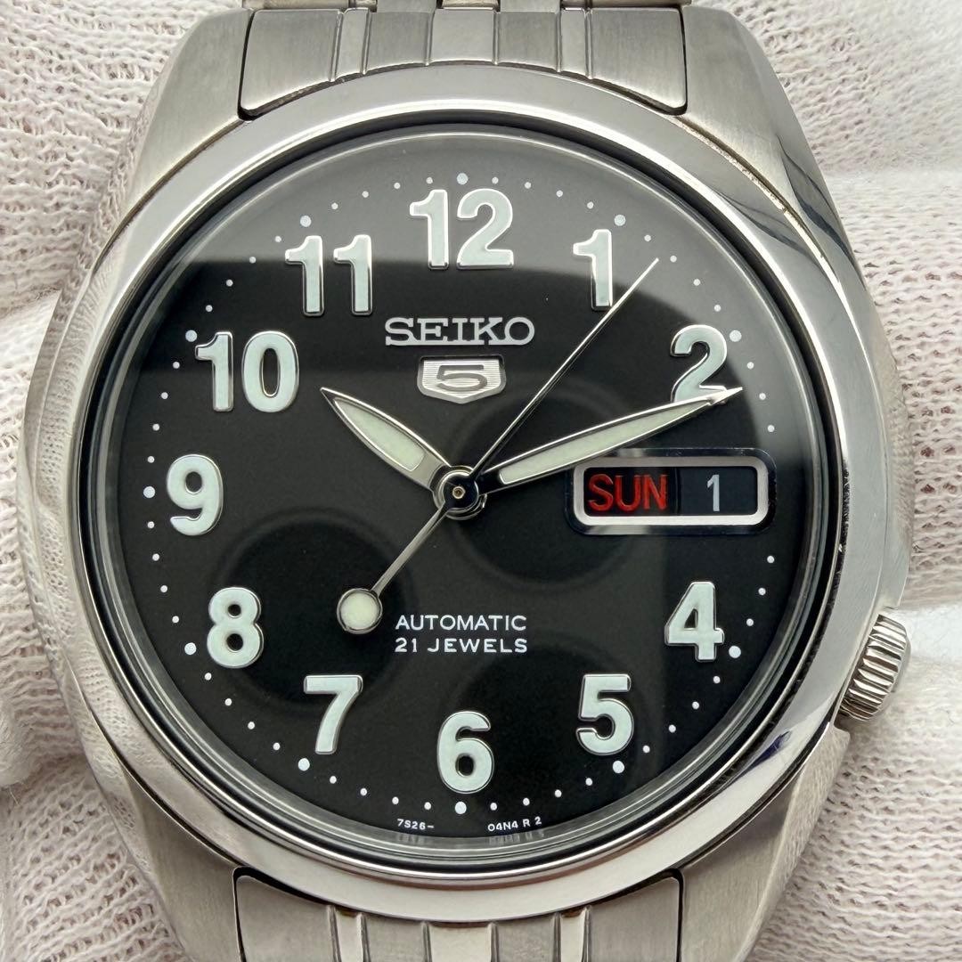 SEIKO 5 7S26-01V0 Automatic, 21 jewels, open case back, black dial