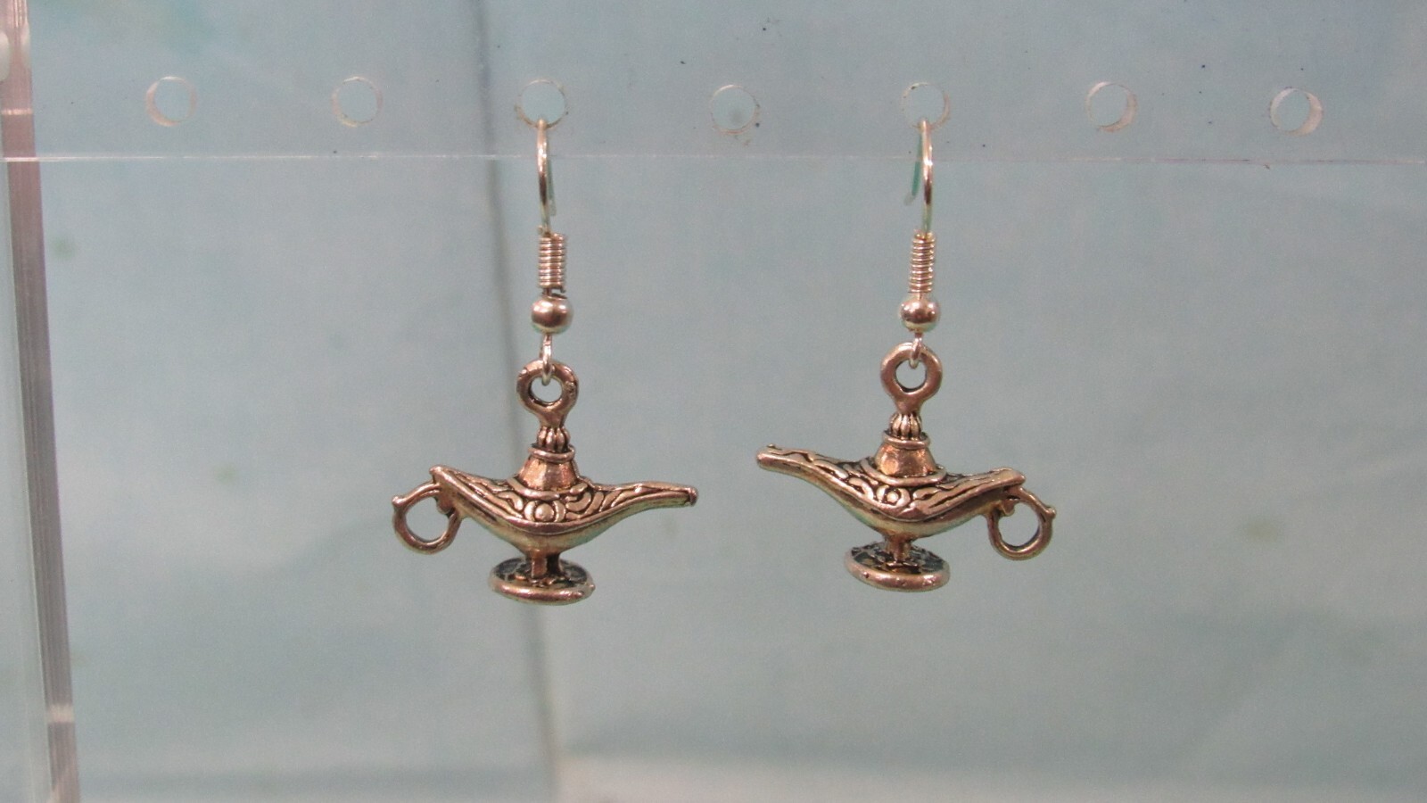 Silver Hook Earrings with a Dangling Silver Tone Genie Lamp