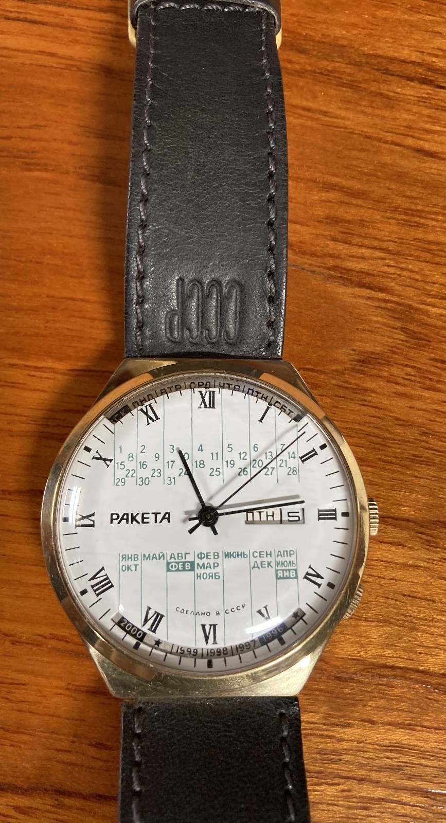 Raketa perpetual calendar watch from USSR, with leather band stamped “CCCP”