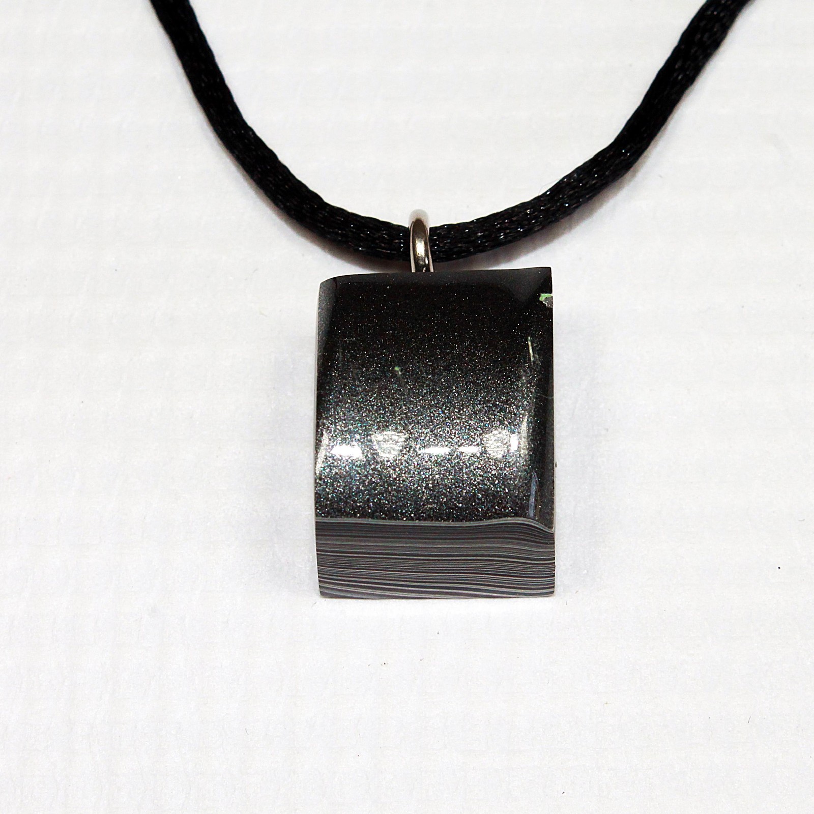 Fordite Necklace – 18.35mm x 15.2mm x 12.83mm – Black Leather Rope (N-019)