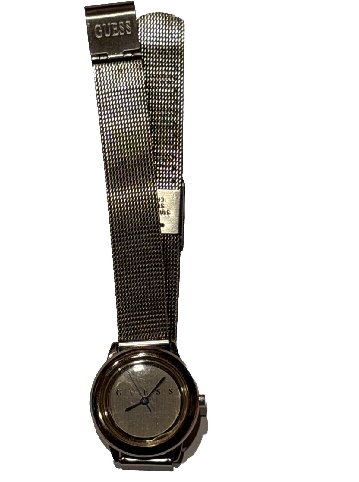 1996 GUESS numberless face watch. silver w adjustable mesh band. new battery.