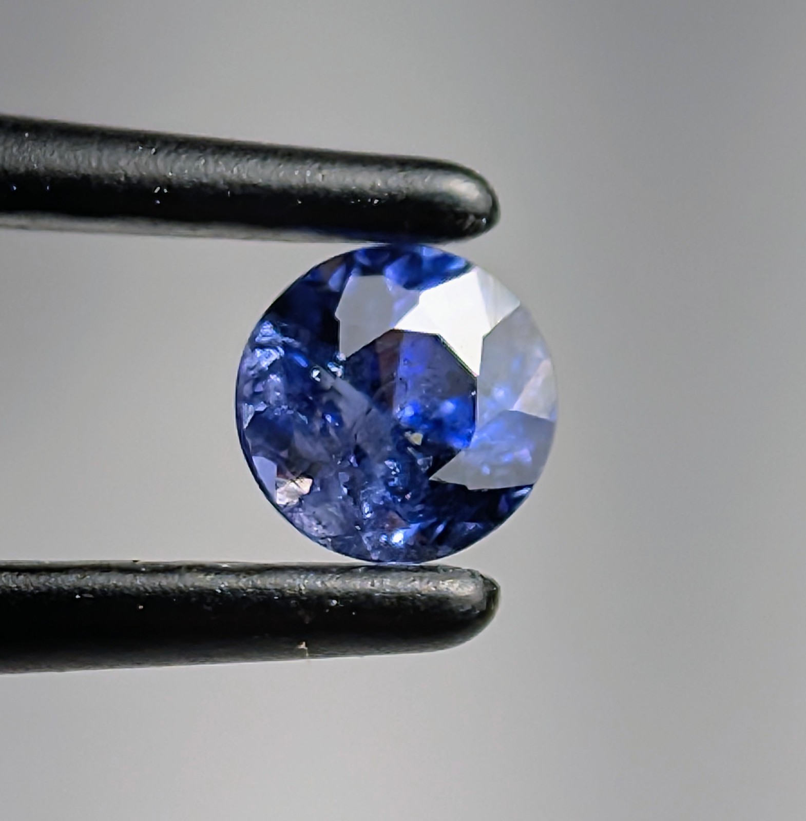 Benitoite: I, round gemstone 0.24 ct