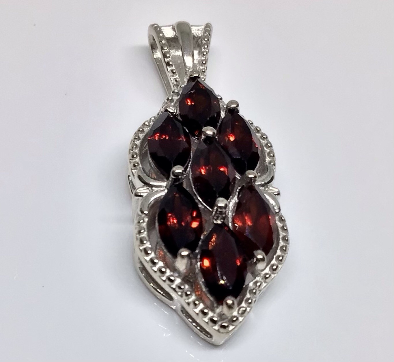 Mozambique Garnet, Platinum / Pure Brass Pendant