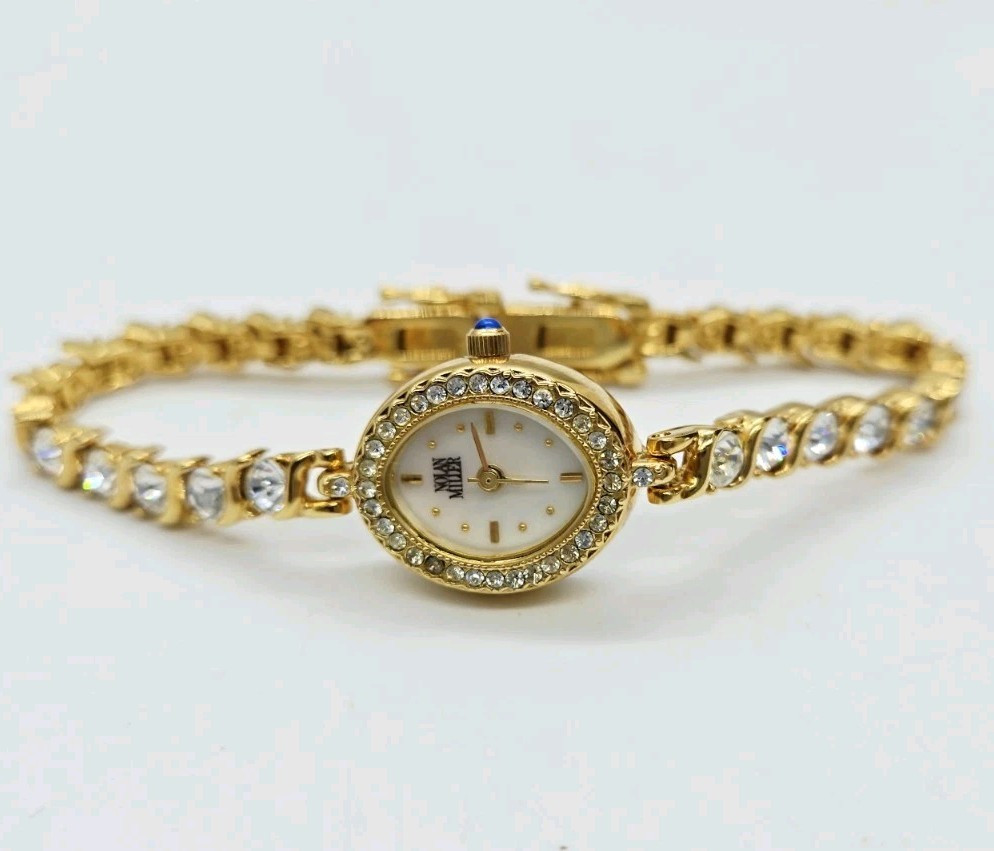 Nolan Miller Watch Tennis Bracelet Crystal Gold tone New battery Oval 7.25 in