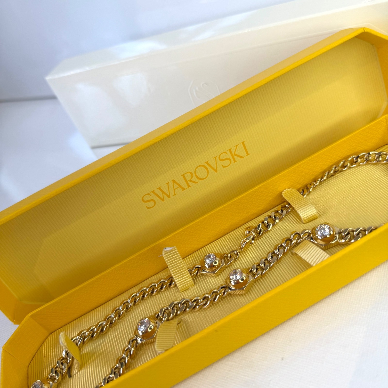 SWAROVSKI Numina Necklace Gold Tone White Crystal Adjustable Chain New In Box