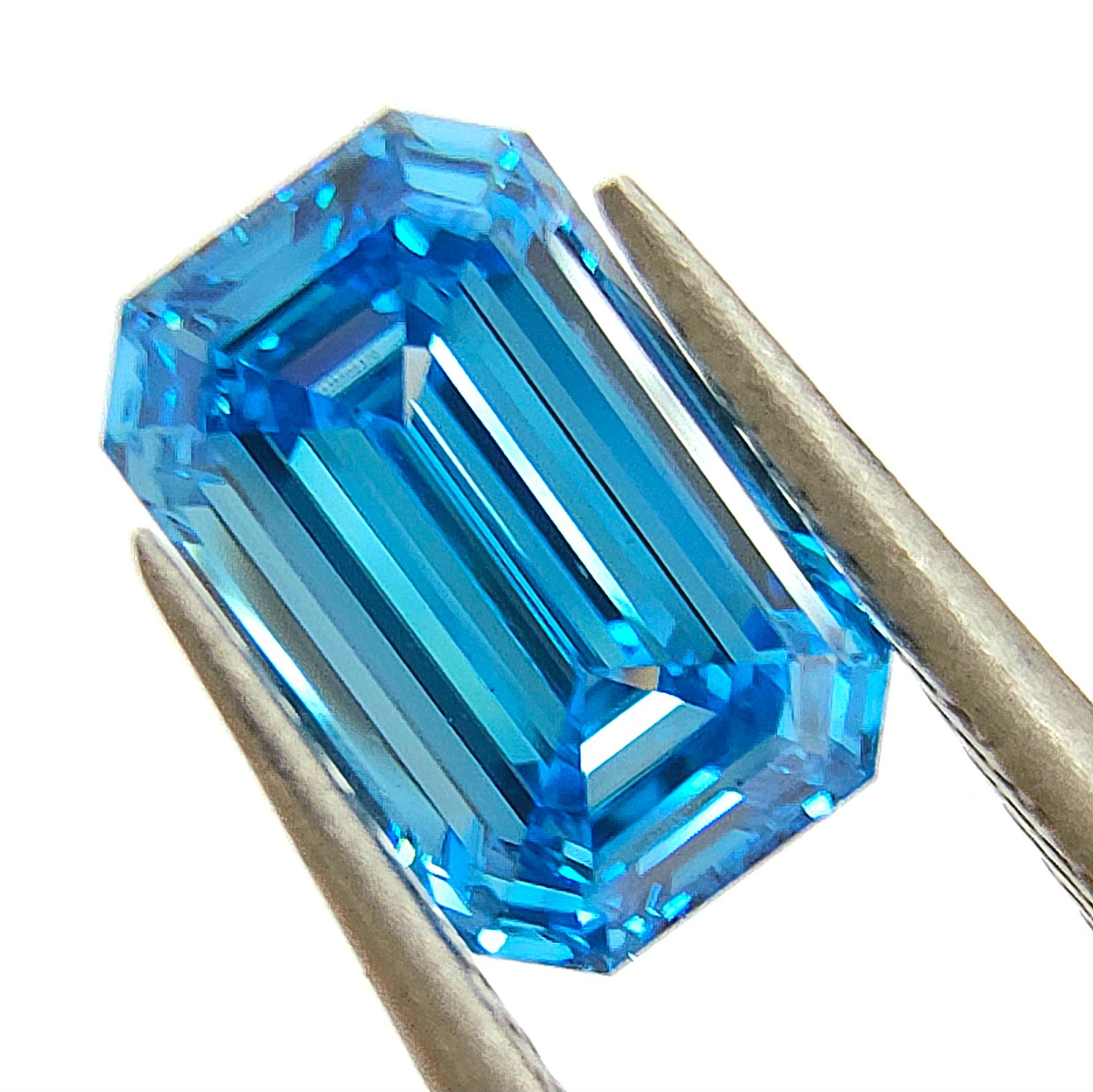 0.78 Carat Fancy VIvid Blue Diamond GIA Certified VS1 Emerald Cut