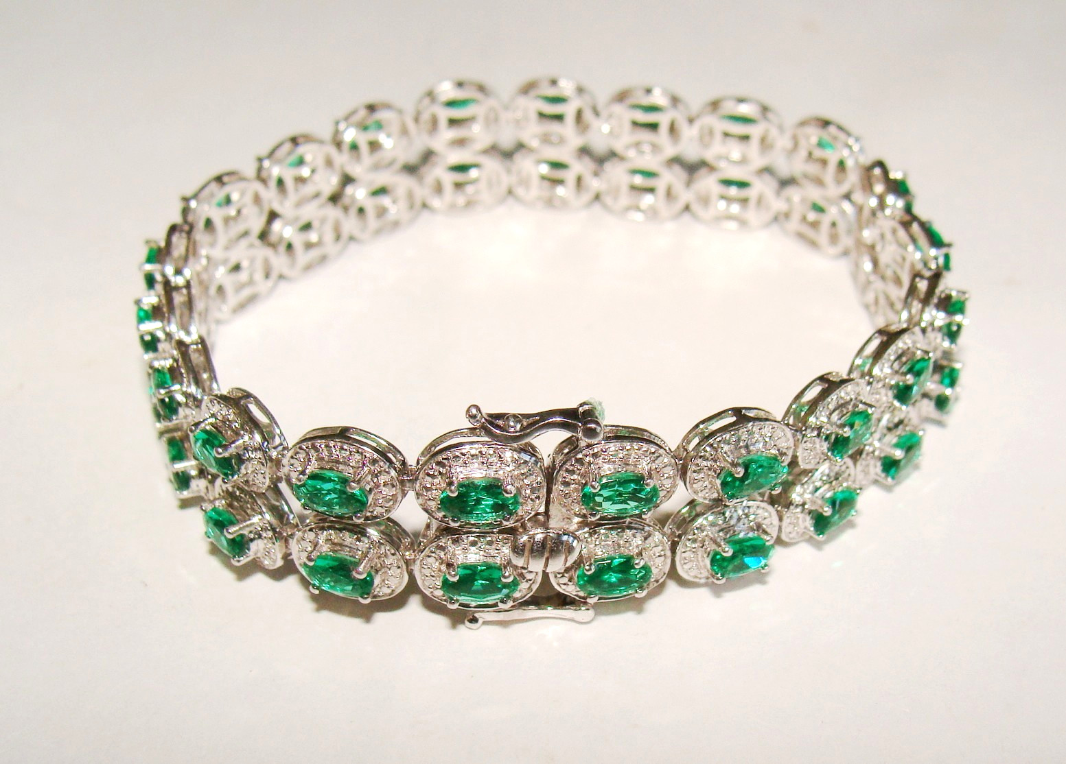 Designer 22.4g Sterling Silver Lab Created Emeralds & 4 Clear Stones Bracelet 7″