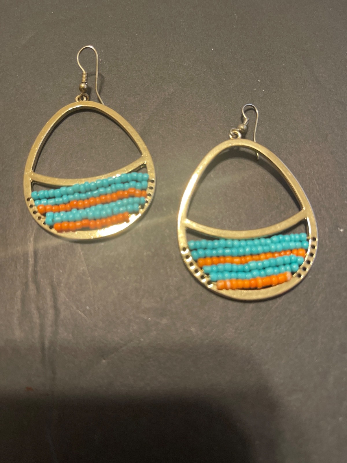 Boho gold earrings with orange and turquoise seed beads