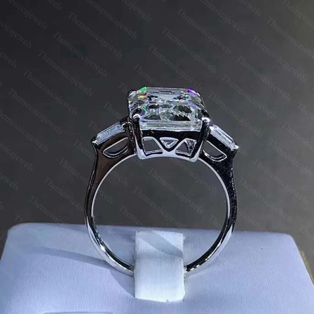 9.0TCW Emerald Cut Moissanite 3-Stone Engagement Ring In 14k White Gold Plated