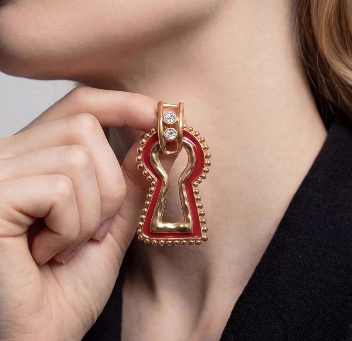 Surrealist, Schiaparelli style, keyhole stud earrings, gold with red enamel