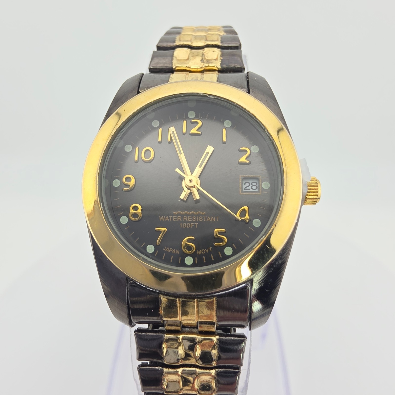 M.Z. BERGER & CO. Ladies Stretch Watch H2O Resistant Black Gold Ion Plated 6.25″