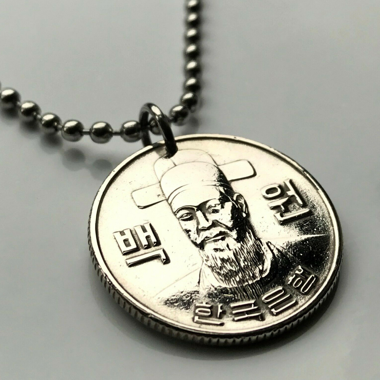 South Korea 100 Won coin pendant Admiral Yi Sun-sin Seoul Busan Daegu n000554