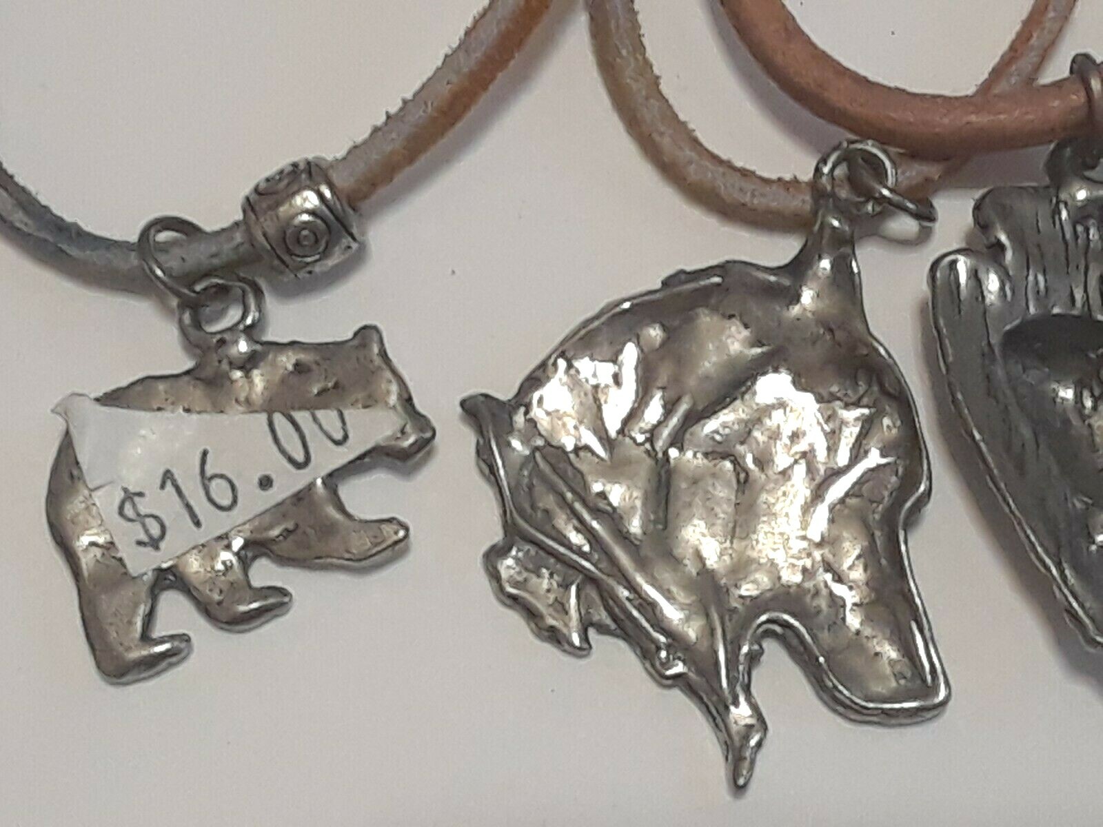 Animal shape pendants silver tone on leather rope chains 18″ long. 5 necklaces