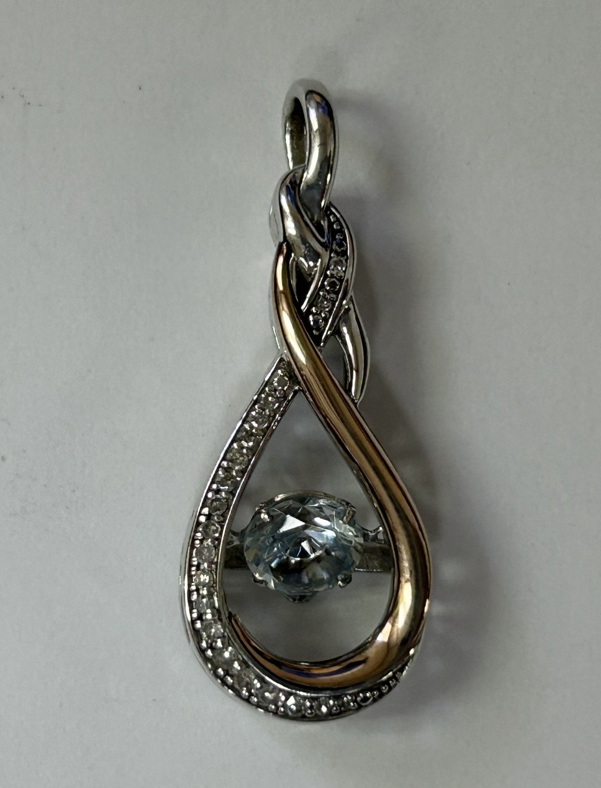 (MA6) OTC 925 / 14k “Rhythm of Love” Diamond Infinity Knot Pendant w/ Blue Topaz