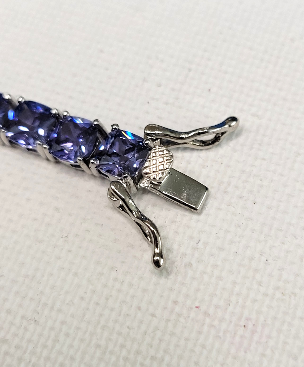 925 Bella Luce Platinum on Sterling Silver Tanzanite CZ Tennis Bracelet 27.5ctw