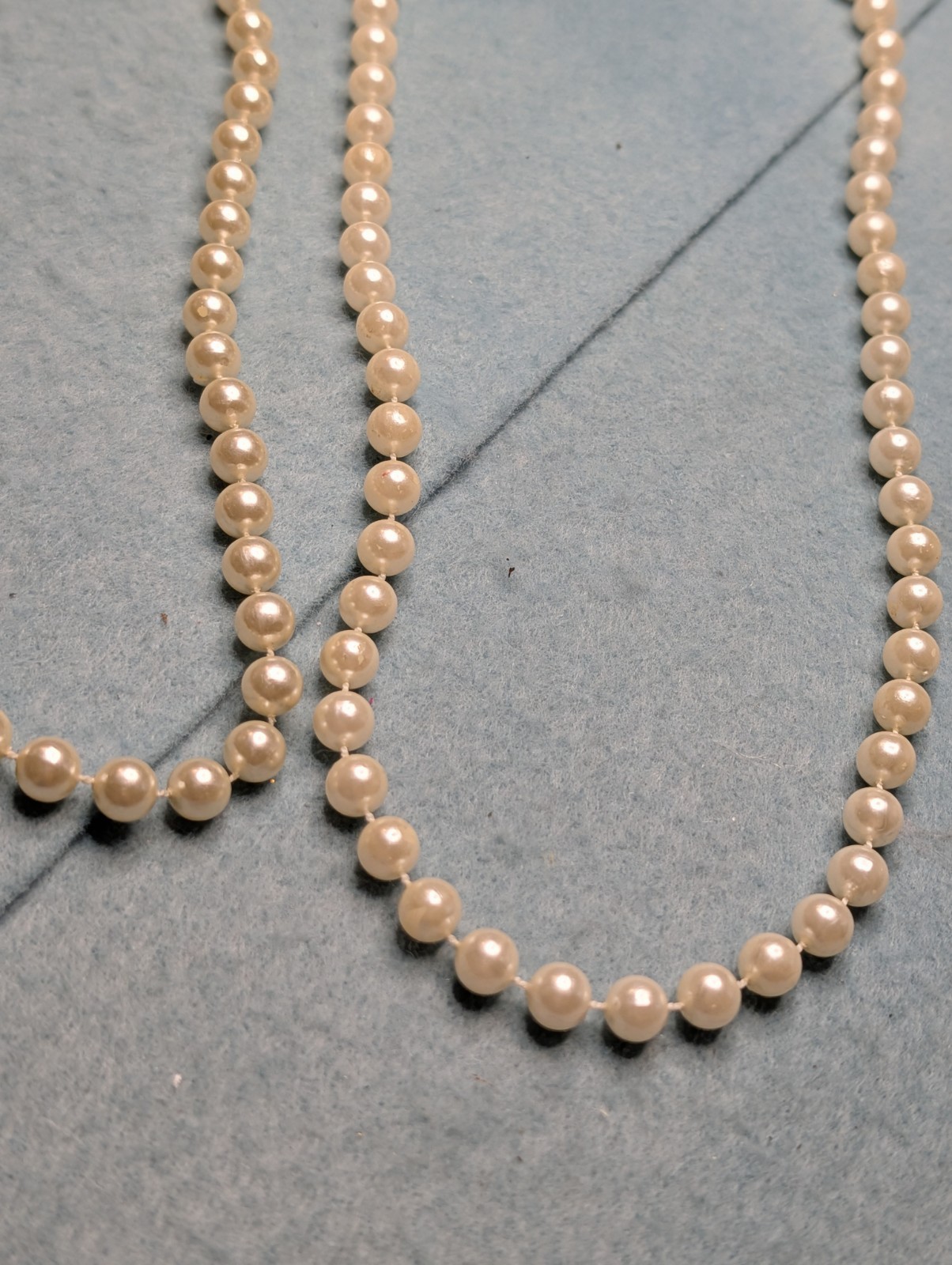 Two Elegant Strands of Classic Fashion White And Off White Faux Pearls