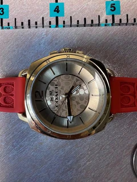 Vintage Coach Boyfriend Watch 34mm Gold Tone Stainless Steel Orange Strap