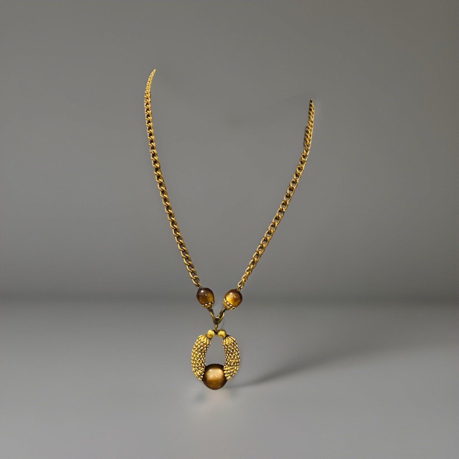 Mcm 20 In Tiger Eye Accent Goldtone Necklace