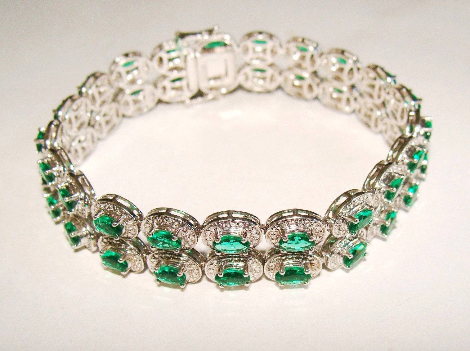 Designer 22.4g Sterling Silver Lab Created Emeralds & 4 Clear Stones Bracelet 7″