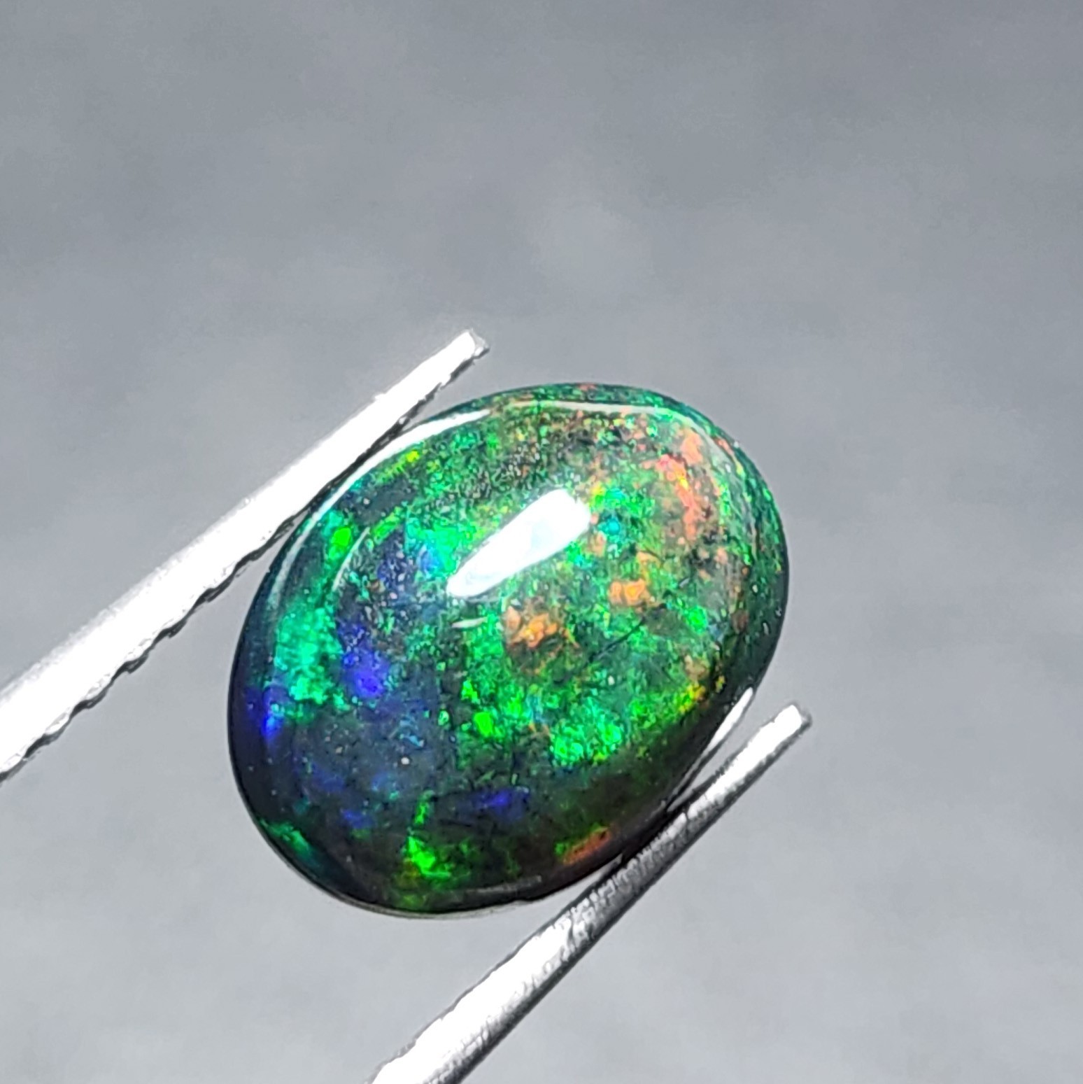Natural Welo Black Opal Ethiopia Oval Cabochon Vivid Green Fire Gemstone 1.20Ct