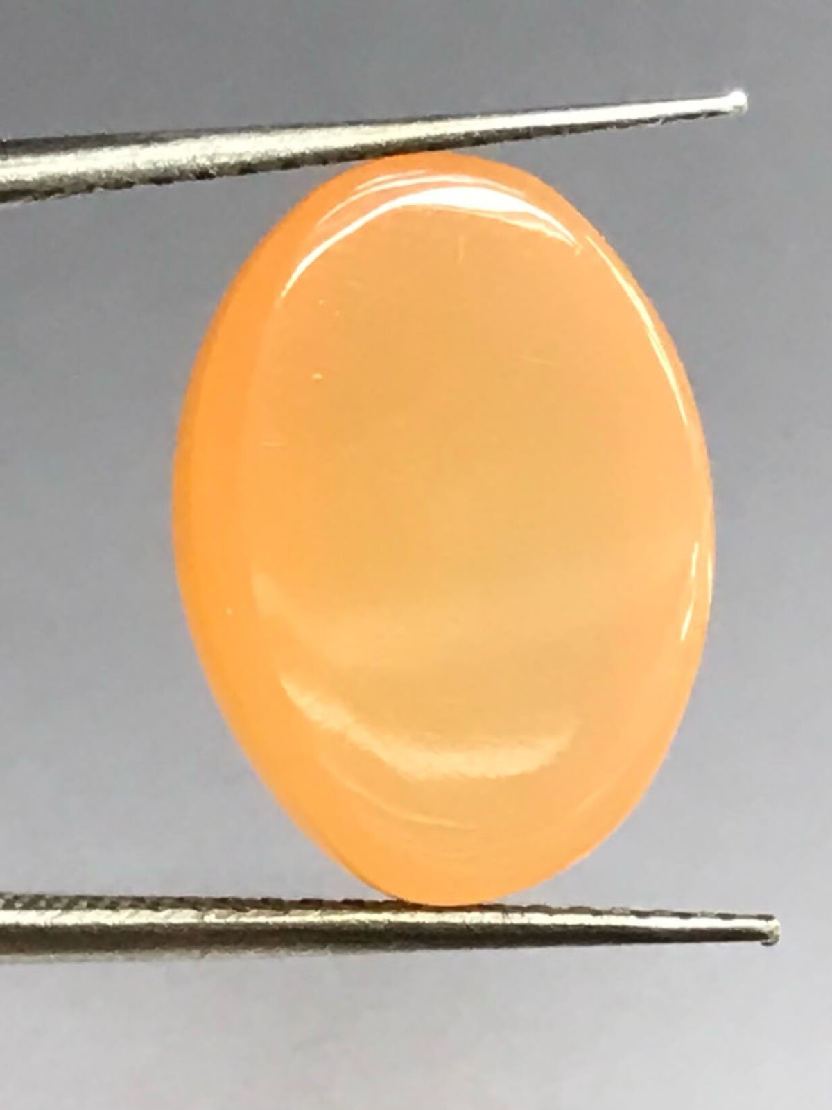 15.56CTS 18X13X9MM Orange and brown moonstone loose gemstone cabochon
