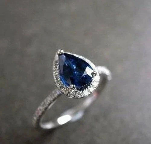 Lab-Created Blue Sapphire 3Ct Pear Cut Halo Ring 14K White Gold Plated Silver