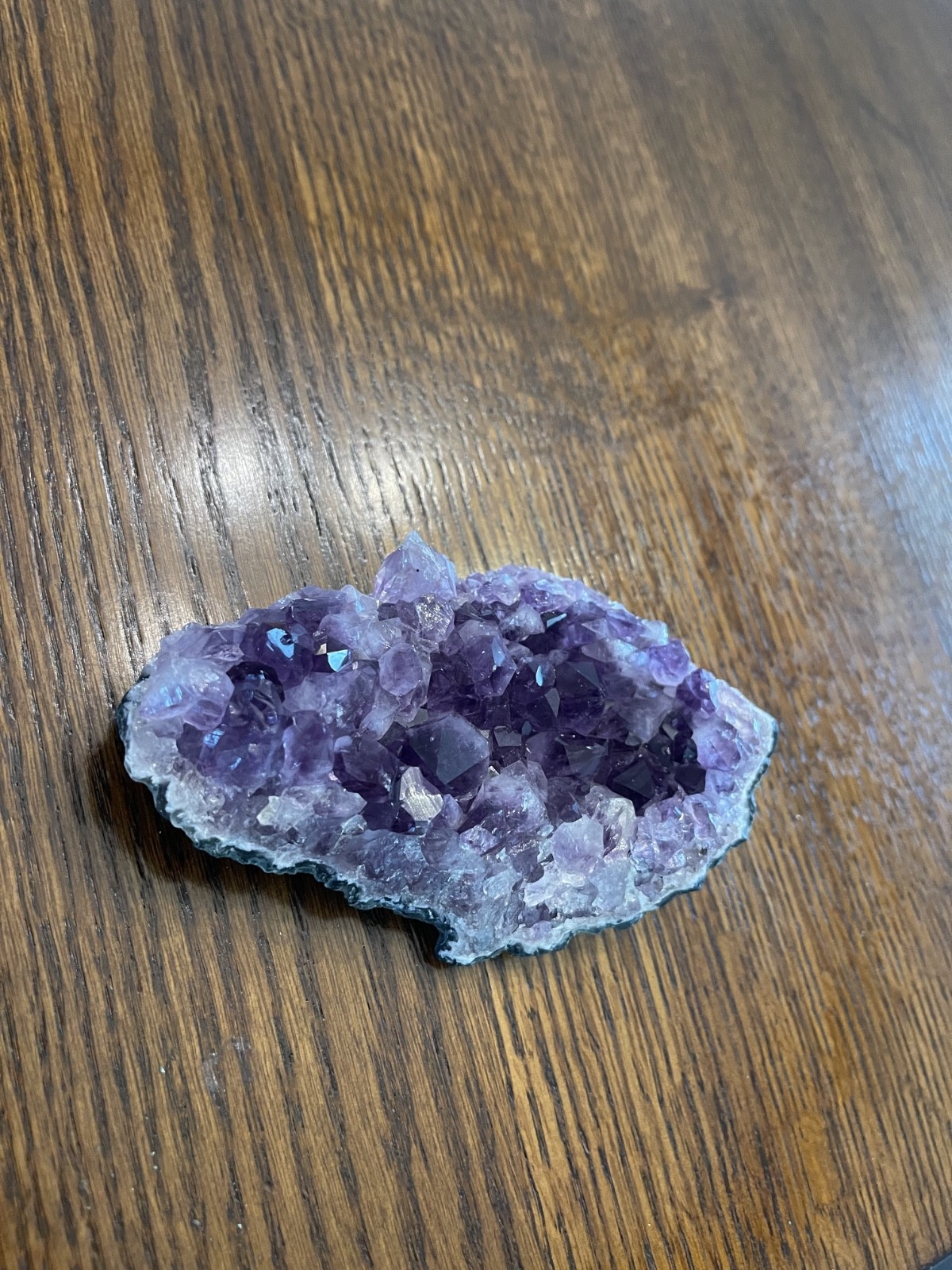 Amethyst crystal 13 inches long, that is natural and weighs 1.3 pounds.
