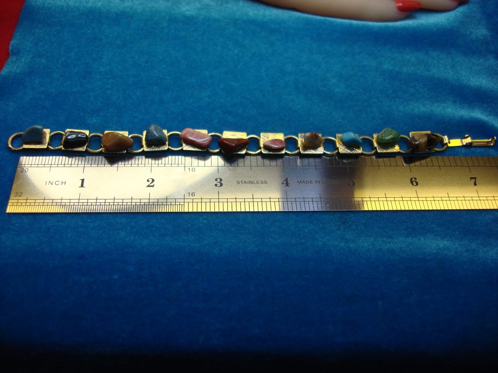 GOLD TONE BRACELET WITH 11 DIFF. NATURAL GEMSTONES – 7″ – PRETTY