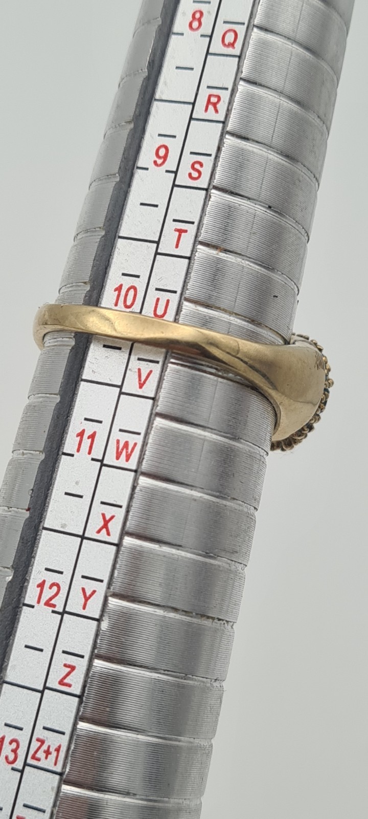 Elegant 375 Yellow Gold Blue Topaz Trim Ring