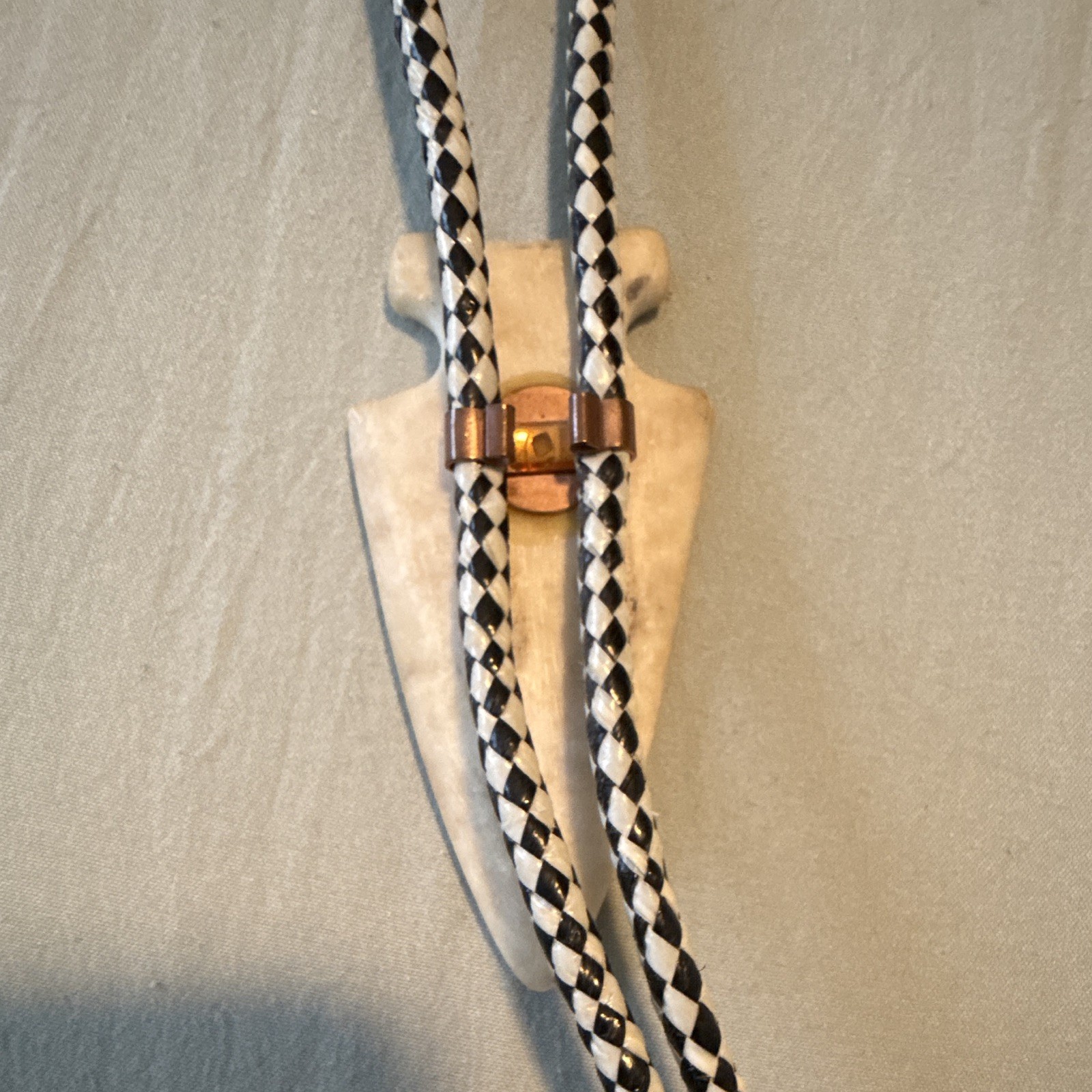Men’s Western Arrowhead Bolo Tie Adjustable Black/White Braided Cord Metal Tips