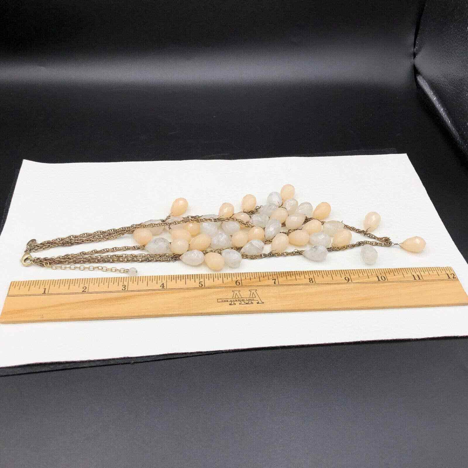 Lydell NYC 3 Strand Necklace Pastel Peach Milky Clear Faceted Briolette Beads