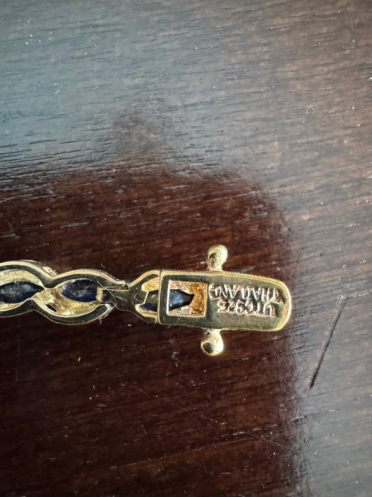STERLING SILVER GOLD PLATED 925 TENNIS BRACELET WITH BLUE STONES 7.5 INCH LONG