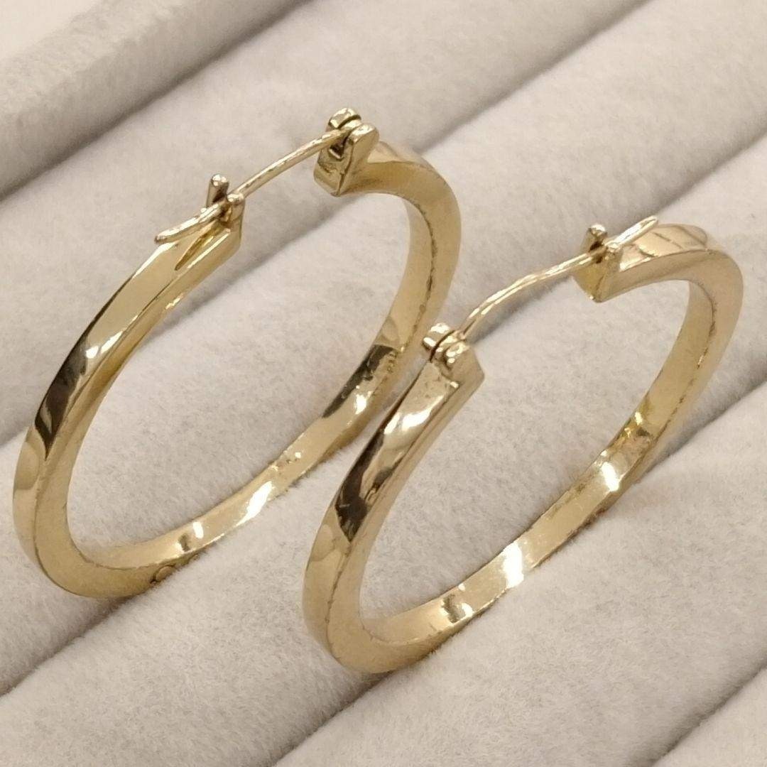 Near mint COACH logo x gold large hoop earrings