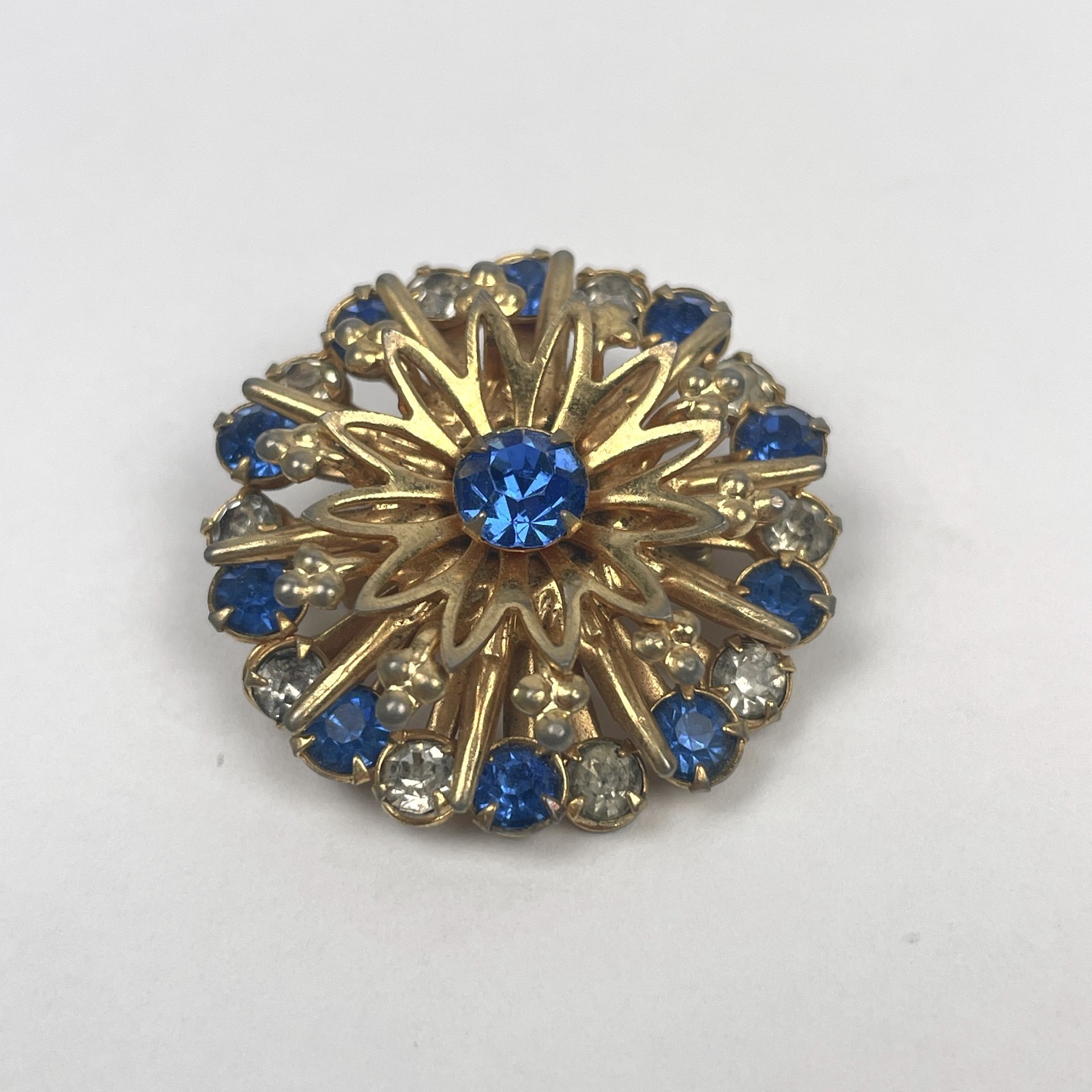 VTG 50s 60s Gold Tone Sunburst Medallion Brooch Blue Clear Rhinestone Pin