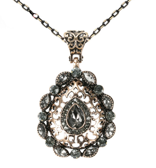 Natural Stone Crystal Zircon Pendant with Unique Hollow Carving Design
