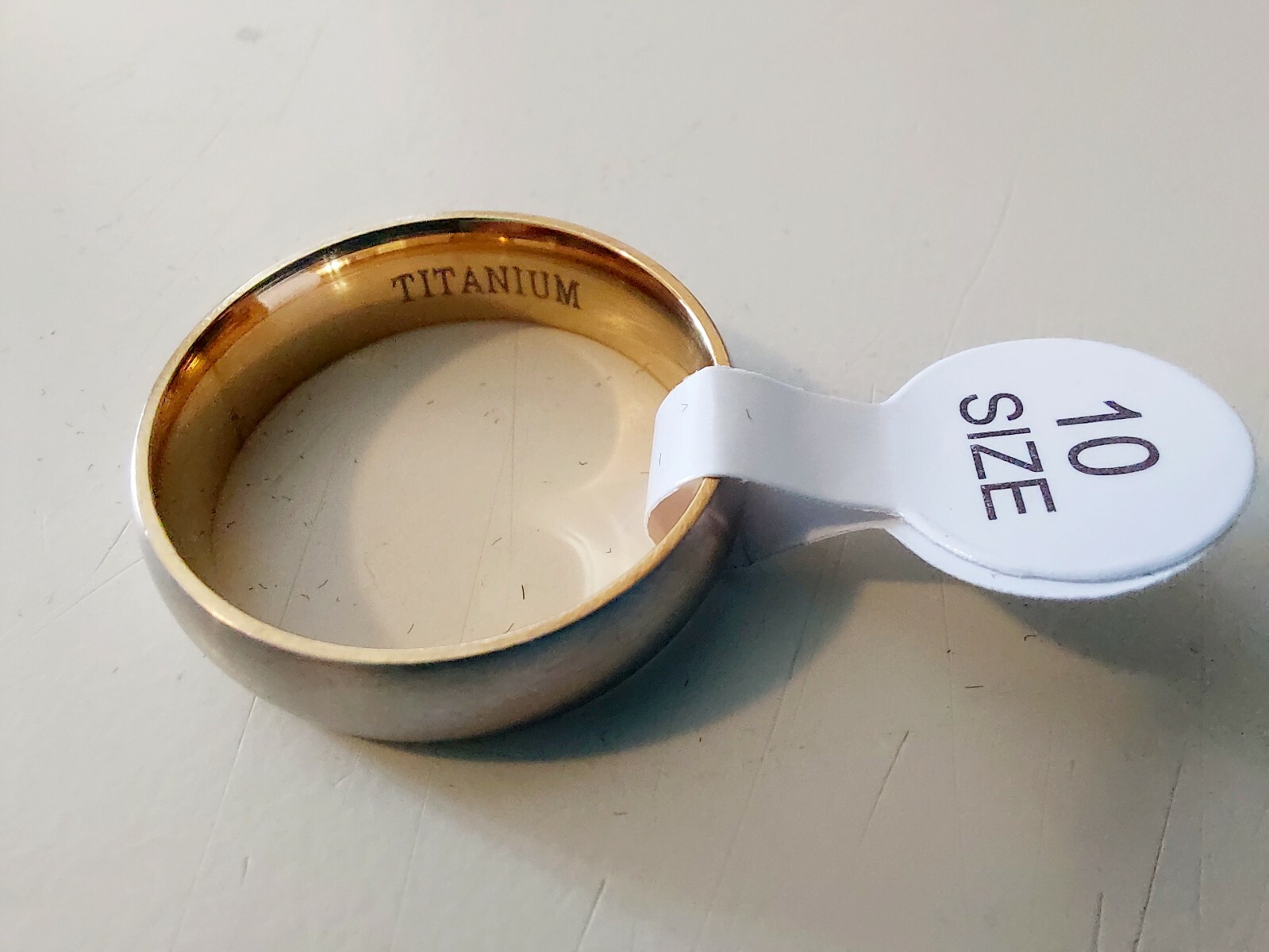Size 10 Silver & Gold Titanium Unisex Band Ring. New. Opened only for photograph