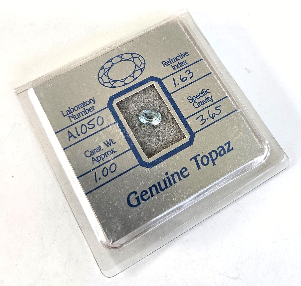 Vintage Blue Genuine Topaz 1.00 Carat Wt Oval 6x5x3.5mm Opex International Card