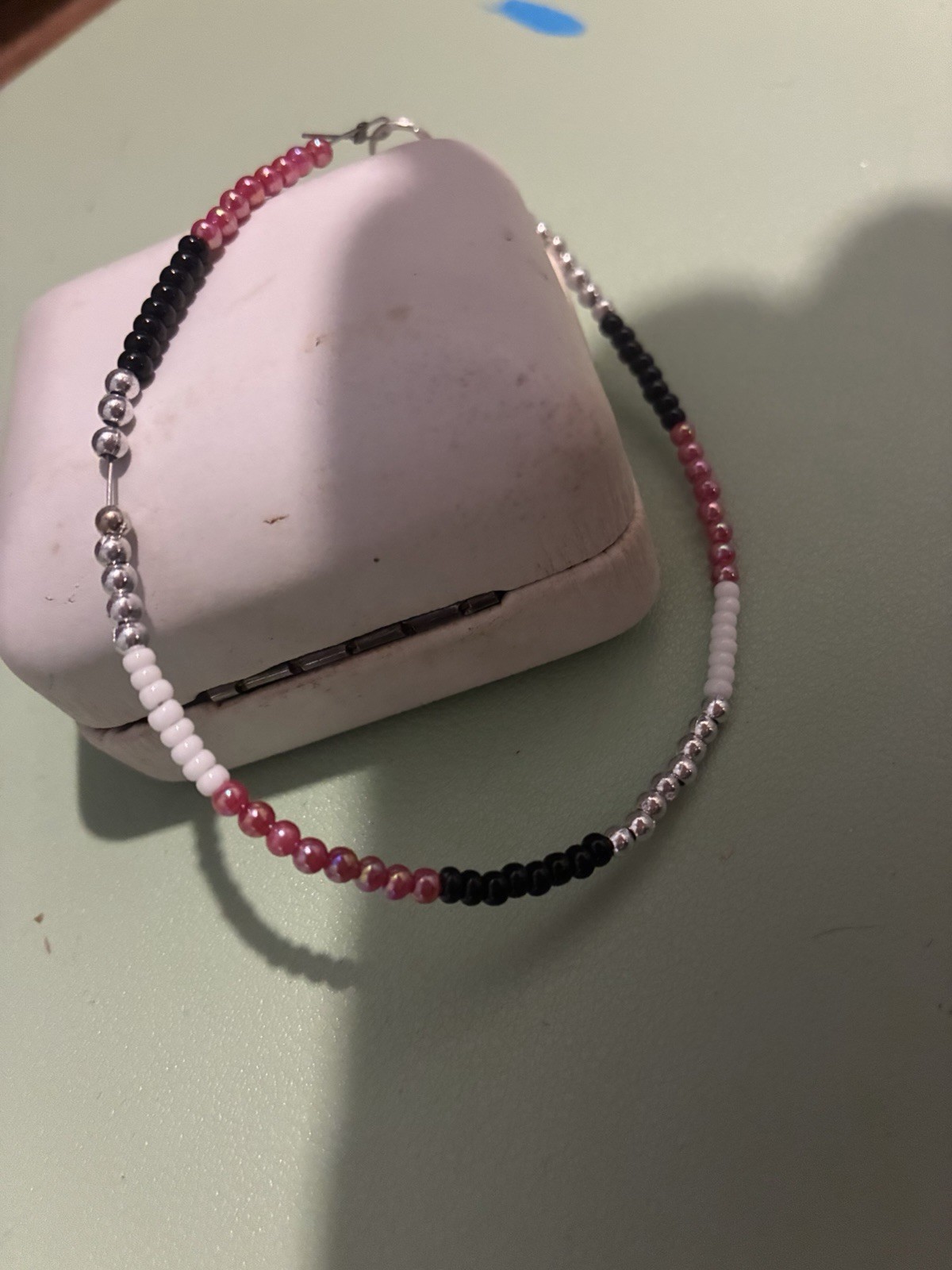 Multicolor Glass Beaded Bracelet with Lobster Clasp Closure.