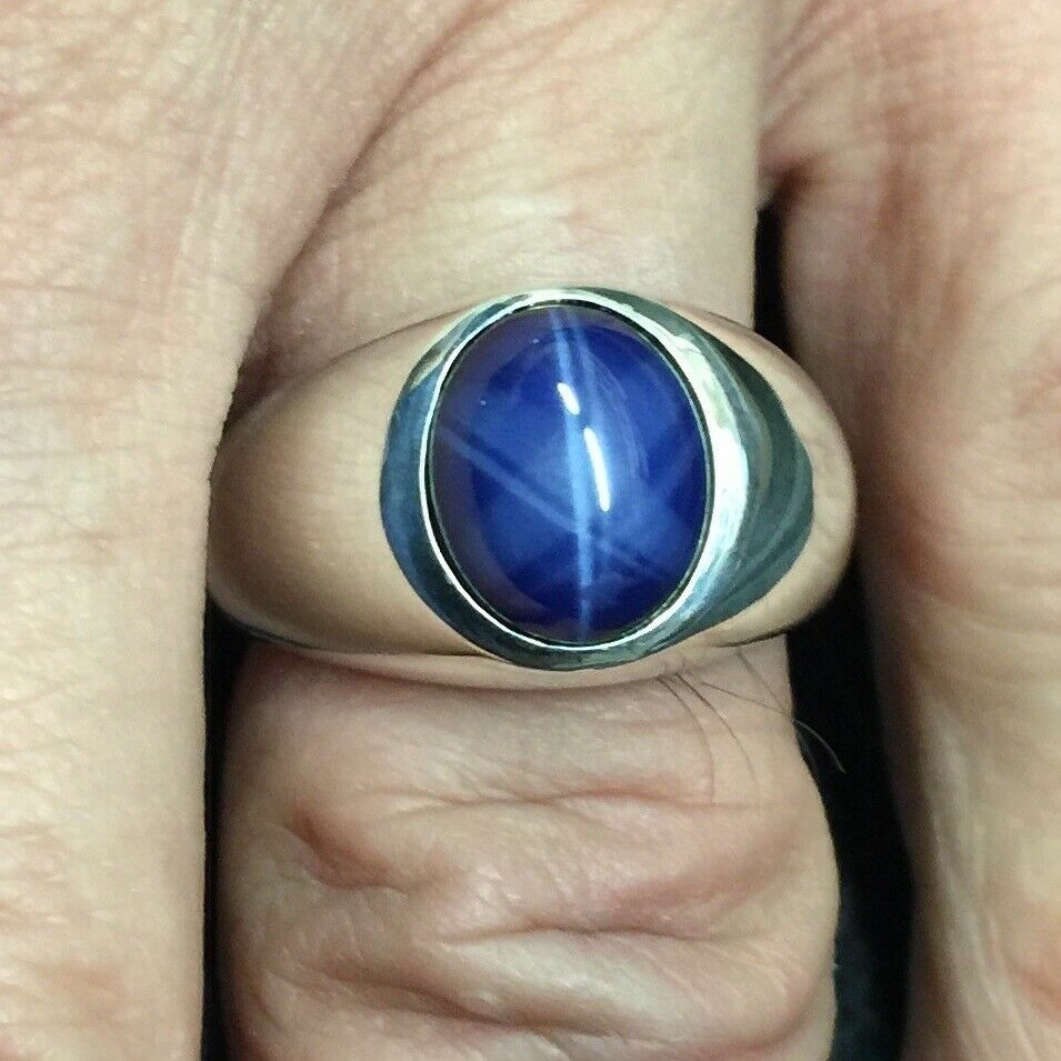 MJG STERLING SILVER BEZEL RING. 12 x 10mm OVAL LAB STAR SAPPHIRE. SZ 9.5